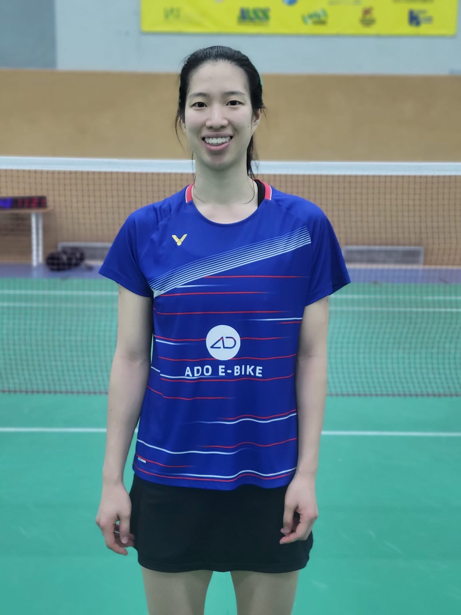 Yvonne Li lächelt auf dem Badmintonfeld